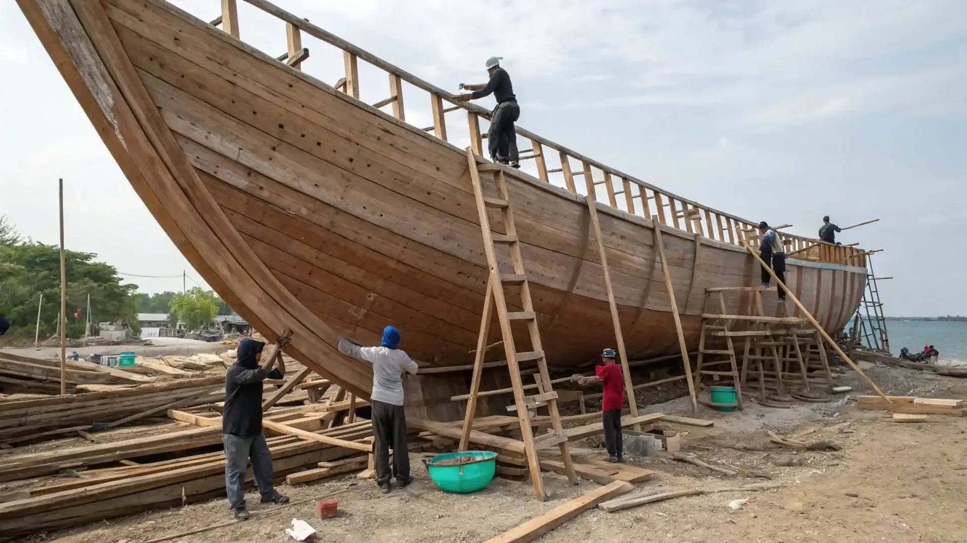 A phinisi under construction, frames and planking in place